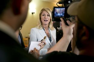 Democratic gubernatorial candidate Wendy Davis, speaks to media during a campaign stop at East Austin restaurant Juan in a Million on May 6th, 2014