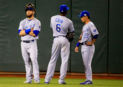 Three members of the Kansas City Royals during a pitching change in Game 5 of the World Series on Oct. 26.
