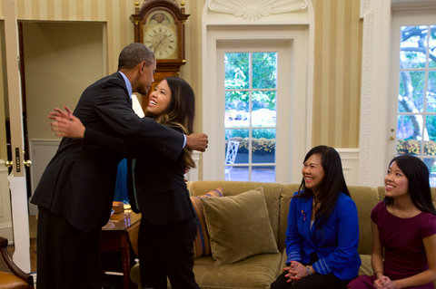 Nina Pham, the Dallas nurse who contracted Ebola while treating a dying patient, embraced President Obama at the White House on Friday after <a href="http://www.nytimes.com/2014/10/25/us/nina-pham-free-of-ebola-virus.html">being released from the hospital</a>.
