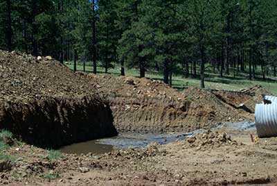 unlined-drill-pit-vermejo-new-mexico-400x268