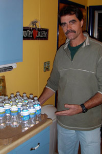 Big Flats, N.Y, resident Joseph Todd turned to bottled water after his well water suddenly turned murky and smelly, shortly after gas drilling began. (Peter Mantius/<a href='http://dcbureau.org/index.php' _cke_saved_href='http://dcbureau.org/index.php'>DCBureau.org</a>)