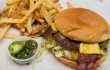 The sandwiches, like this bacon cheeseburger, aren’t fancy, but they are tasty and very wallet-friendly. Brian Hutson