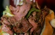 Mo’s pastrami sandwich is “packed to bursting.” Lee Chastain