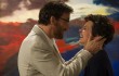 Clive Owen and Juliette Binoche share a laugh in front of one of her paintings in Words and Pictures.