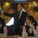 An instructor at the International Butler Academy China demonstrates proper wine-pouring technique. China’s economy has grown rapidly in the past few decades, and one consequence is a rise in the number of millionaires and billionaires.