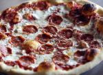 Detail photo of New York style pepperoni pizza at Trilogy Pizza Sunday Sept. 7, 2014.