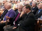 Robert Hibbs (left), a retired bishop suffragan,looks over at the Rt. Rev. David Reed Saturday Oct. 25, 2014 as Reed returned to his seat after giving a short speech when it was announced he was elected coadjutor bishop of the Episcopal Diocese of West Texas. About 400 delegates from the diocese voted during the special council to elect a bishop coadjutor at TMI-The Episcopal School of Texas. Reed who is currently the Bishop Suffragan of the Diocese, was one out of six nominees for the position and won on the first ballot taken, which has only happened one other time, in 1943. Reed will take over in 2017 when the current bishop, the Rt. Rev. Gary Lillibridge will retire.