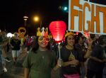 Elizabeth Garcia, 10, and Caitlin Guarnero, 17, walk during the Light The Night Walk fundraising campaign of the Leukemia and Lymphoma Society Saturday October 18, 2014 at La Villita. The money  raised by the campaign help fund advanced therapies.