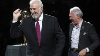 Spurs' head coach Gregg Popovich walks away with his 2014 NBA Championship ring during the ring ceremony and season opener against the Dallas Mavericks at the AT&T Center on Tuesday, Oct. 28, 2014. (Kin Man Hui/San Antonio Express-News)