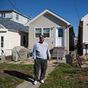 Stephen Drimalas stands outside his former home in Staten Island's Ocean Breeze neighborhood. He rebuilt his home after Superstorm Sandy but recently decided to sell it to the state of New York.