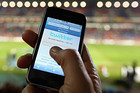 NEWCASTLE, AUSTRALIA - JULY 11:  In this photo illustration the Twitter website is displayed on a mobile phone at a NRL match on July 11, 2009 in Newcastle, Australia. The micro-blogging phenomenon sees users post text 'tweets' of upto 140 characters in response to the question 'What are you doing?'.  (Photo by Cameron Spencer/Getty Images)