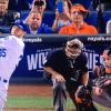 Who is the guy in the Marlins jersey behind home plate at the World Series?