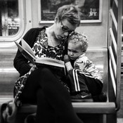 Original caption via Instagram: #pscommute 5:15 PM on the C Train. 34th Street, Penn Station back home to Fort Greene, Brooklyn. Giving the gift of reading. A magical moment between mother and son. It may seem like just another subway ride, but with a book and an imagination, the adventures are limitless.