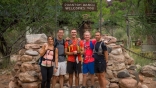 Watching the sun rise, four friends reflected on the accomplishment they completed the night before— running across all  miles of the Grand Canyon, the span of the national landmark.