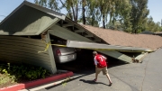 A magnitude . earthquake hit Northern California near Napa Valley Sunday, injuring at least  people and causing extensive damage, including fires sparked by burst gas lines, in the largest tremor to rock the Bay Area since the magnitude . Loma Prieta quake in .