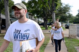 Jay Wiley, a candidate for Austin City Council, block walked on Saturday with campaign team member Corey Rose, back, and Wiley's family: wife, Sally, and sons Anders, 7, and Dyson, 8.