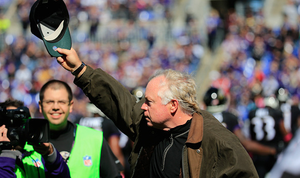 Manager Buck Showalter of the Baltimore Orioles takes a curtain call before a game between the Baltimore Ravens and Atlanta Falcons at M&T Bank Stadium on October 19, 2014 in Baltimore, Maryland.  (Photo by Rob Carr/Getty Images)