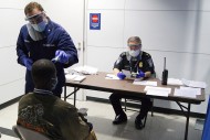 Pre-screening measures being conducted at Chicago's O’Hare International Airport on Oct. 16 on a passenger who arrived from Sierra Leone 