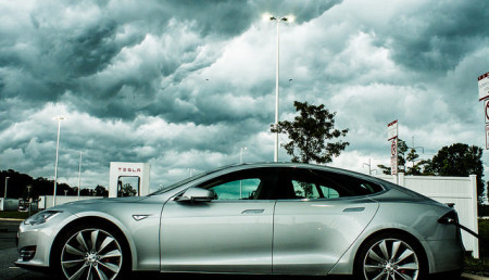 Tesla Model S charging while a summer Delaware thunderstorm takes shape. photo: jbpribanic