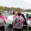 Evergreen Commons Nursing Home employees, Donna Hopkins, left, R.N. and assistant director of nursing, Kari Neubauer, second from left, director of human resources, Deb DeLuke, third from left, R.N. unit manager and Debbie Jakob, with human resources, put on crowns and pink pink feather boas before getting into a limousine on Wednesday, Oct. 29, 2014, in East Greenbush, N.Y.  On Wednesday female employees at Evergreen Commons Nursing Home were able to take time off from work to get mammography screening at a local imaging center. (Paul Buckowski / Times Union)