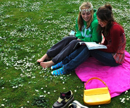 Women reading in park