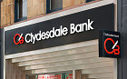 Clydesdale Bank sign and symbol above the high street branch