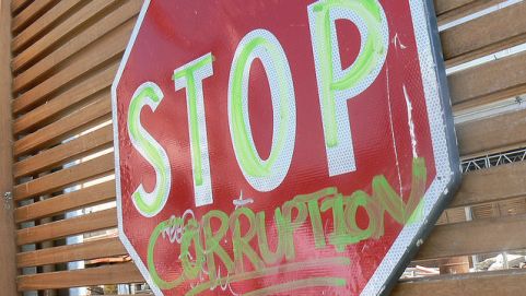 corruption, money and politics (Flickr/ kmillard92)