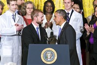  President Barack Obama shakes hands Wednesday with Ebola survivor Kent Brantly during an event with American health care workers in the East Room of the White House in Washington.