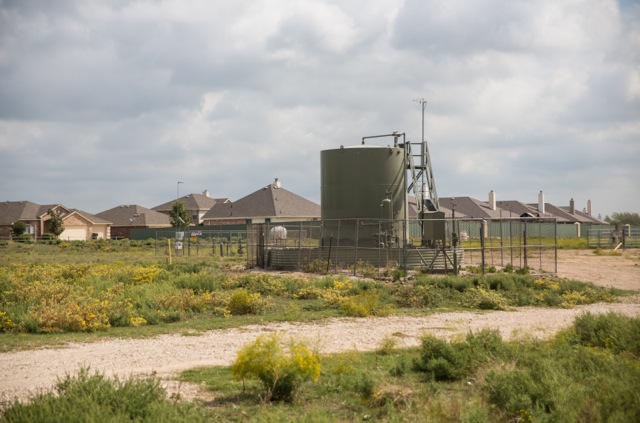 A tank used in natural gas production in Rhomes, Texas, in the Shale Creek community ©2013 Julie Dermansky