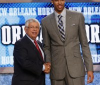 NBA prospect Davis from the University of Kentucky shakes hands with NBA Commissioner Stern after being selected by the Hornets as the first overall pick in the 2012 NBA Draft, in Newark