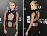 Miley Cyrus Flashes Boobs In Bondage Gown At amfAR Gala