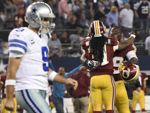 Washington players celebrate after defeating the Dallas Cowboys at AT&T Stadium in Dallas on Monday.