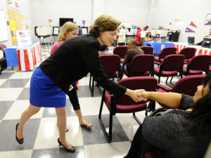 Democratic candidate for U.S. Senate Michelle Nunn, of Georgia, and her daughter Elizabeth greeting voters on Oct. 15 in Fulton County.