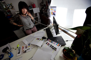 Clothing designer Ariunaa Suri works in her office at the Gobi cashmere company in Ulan Bator. Before mining, cashmere was Mongolia's main export.