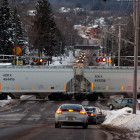 A Union Pacific train blocks traffic on Main Street in Chippewa Falls in February. Some area residents have become frustrated by hours-long road blockages caused by halted frac-sand trains.