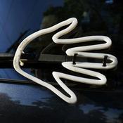 The Wiper Wave, attached to your car's rear wiper, promises to take a bit of the tension out of the rough commute.