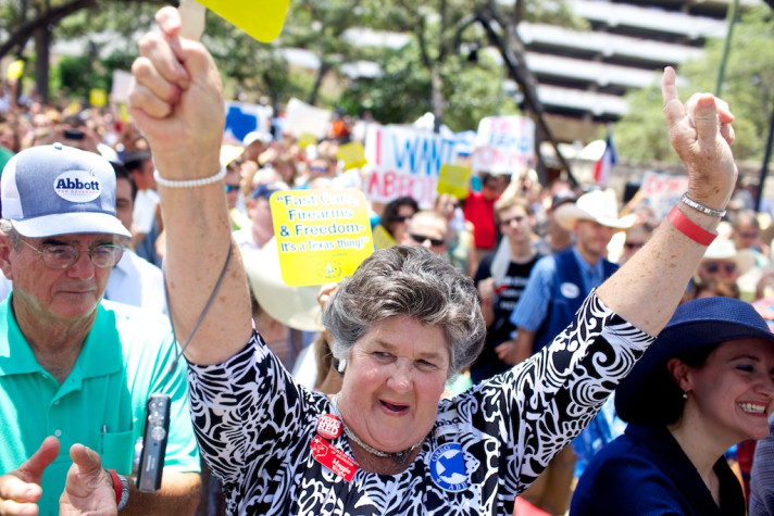 Abbott supporters cheer on the attorney general as he begins his campaign for governor.