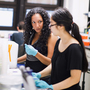 Victoria Ruiz (left), a postdoctoral fellow in immunology, works with Brianna Delgado, a high school student that she mentors, at the Blaser Lab, inside NYU's Langone Medical Center in New York, NY.
