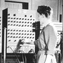 Jean Jennings (left) and Frances Bilas set up the ENIAC in 1946. Bilas is arranging the program settings on the Master Programmer.