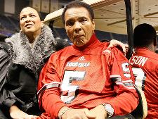 Muhammad Ali attending Florida State-Louisville game