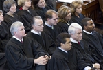 Texas Supreme Court justices listen to the State of the Judiciary speech on February 23, 2011.