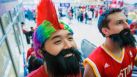 Houston Rockets fans Van Nguyen, left, and Jack Simiskey wear give-away James Harden beards as they arrive at the arena for Game 4.
