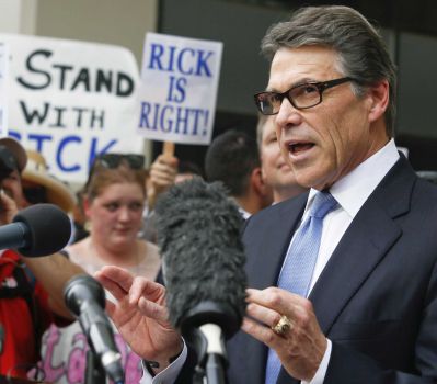 Gov. Rick Perry did nothing to deserve the two-count indictment handed down against him. Texas Democrats absurdly called on him to resign. Photo: Bloomberg / © 2014 Bloomberg Finance LP
