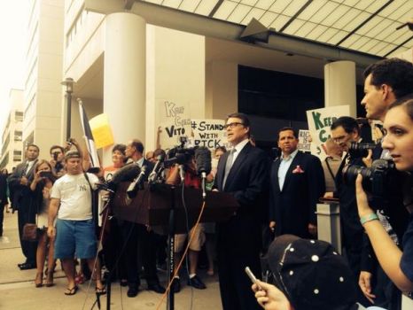 Rick Perry address the media and supporters at the Travis County Courthouse, where he turned himself in following a felony indictment for abuse of power. (Photo via twitter.com/davidSrauf) Photo: David Saleh Rauf/San Antonio Express-News