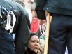 Members of Occupy Houston are arrested after sitting in the middle of Travis Street to block the North Freeway on-ramp after a march through downtown Houston Nov. 17, 2011.