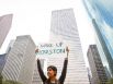 Hiba Siddiqui holds a sign as she and other protestors with the Occupy Houston movement, an outgrowth of the Occupy Wall Street protests in New York, gather at City Hall in downtown Houston to denounce what they describe as social and economic equality and corporate greed, Thursday, Oct. 6, 2011, in Houston.