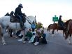 Members of Occupy Houston sit in the middle of the street in downtown Houston Nov. 17, 2011.