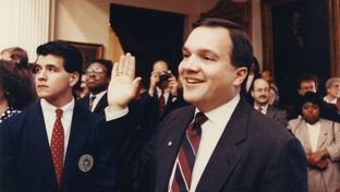 State Rep. John Carona holds up his right hand during his first swearing-in ceremony for the 72nd Legislature on January 8, 1991.