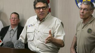 Gov. Rick Perry and DPS Director Steve McCraw spoke at a June 23, 2014, news conference following a tour of a federal facility housing unaccompanied minors in Weslaco, Texas. The state is providing $1.3 million per week to step up border patrols.