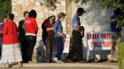 Voters stand in line to vote at an early voting polling site in San Antonio. Supreme Court this weekend gave Texas permission to enforce a contested voter ID law this election, and liberals are screaming loudly.